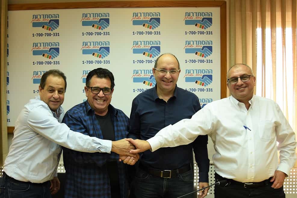 מנכ"ל קבוצת שיכון ובינוי משה לחמני, יו"ר ההסתדרות אבי ניסנקורן, יו"ר הסתדרות עובדי הבניין והעץ יצחק מויאל ויו"ר ההסתדרות במרחב רמת גן-בני ברק אבי לוי גלילי // צילום: דוברות ההסתדרות