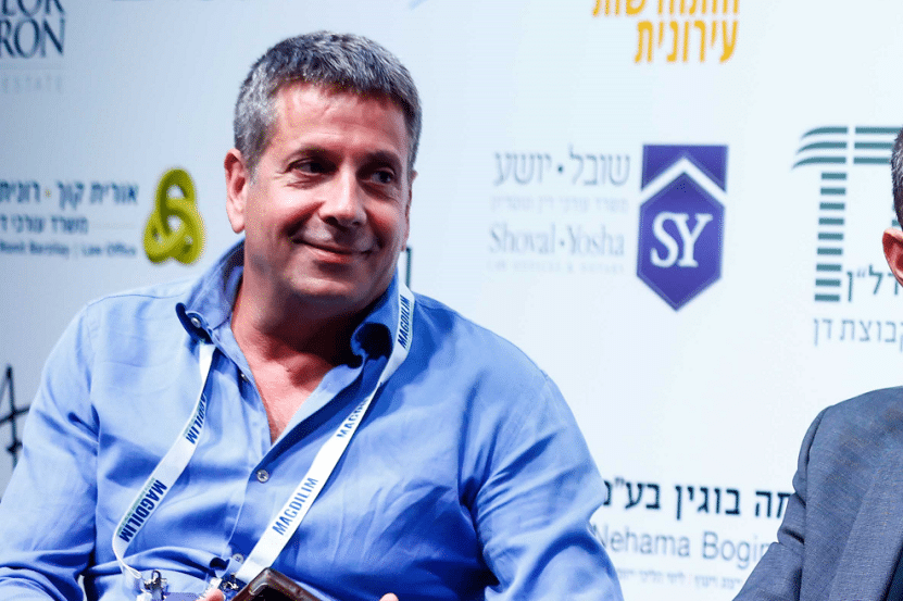 עו"ד גיא פרבמן בכנס מגדילים // צילום: דרור סיתהכל