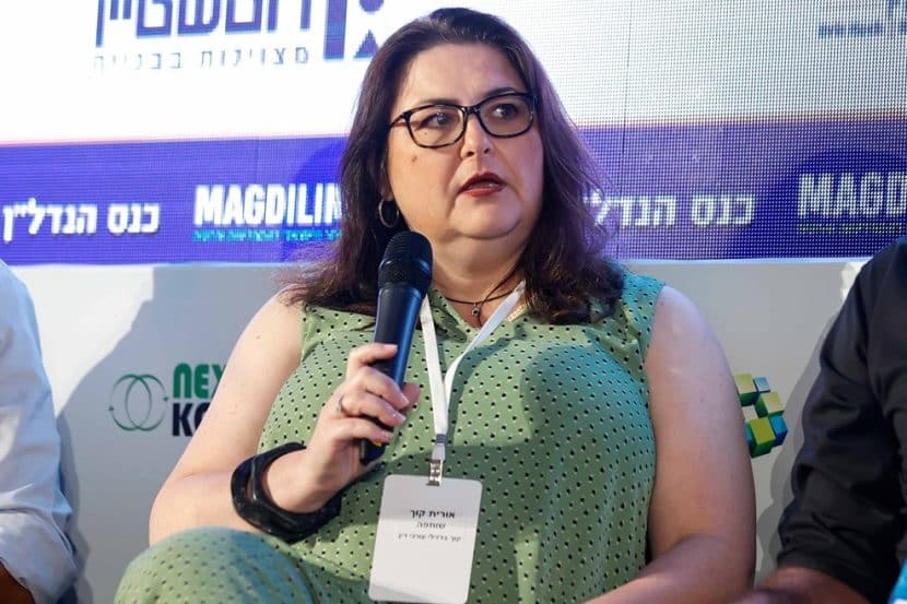 עו״ד אורית קוך בכנס הנדל"ן השנתי של אתר מגדילים // צילום: דרור סיתהכל
